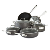 All-Clad HA1 10-piece hard anodized nonstick cookware set displayed on a kitchen countertop including pots, pans, and lids