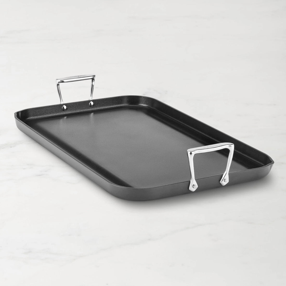 All-Clad HA1 Hard Anodized Nonstick Flat Double Burner Griddle shown on stovetop with smooth cooking surface