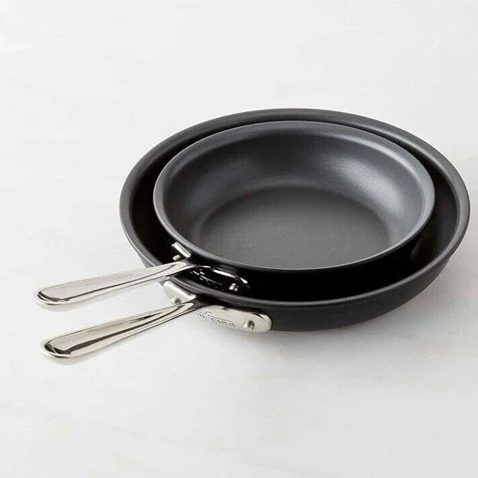 All-Clad NS1 nonstick 8-inch and 10-inch induction fry pans shown together on white background