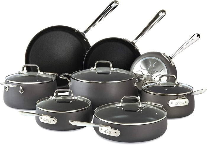 All-Clad HA1 E100SB64 13-piece nonstick cookware set with fry pans, saucepans, sauté pan, soup pot, and stockpot on white